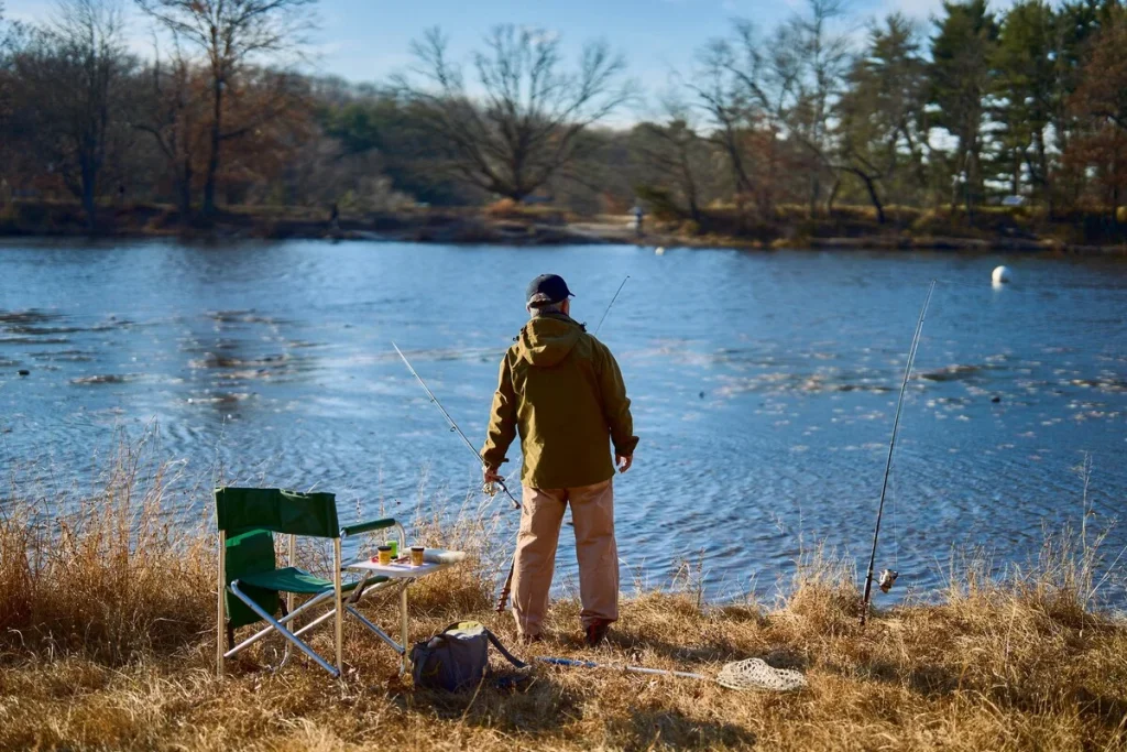 Fishing activity beside a lake representing aquaculture and sustainable fishing innovation