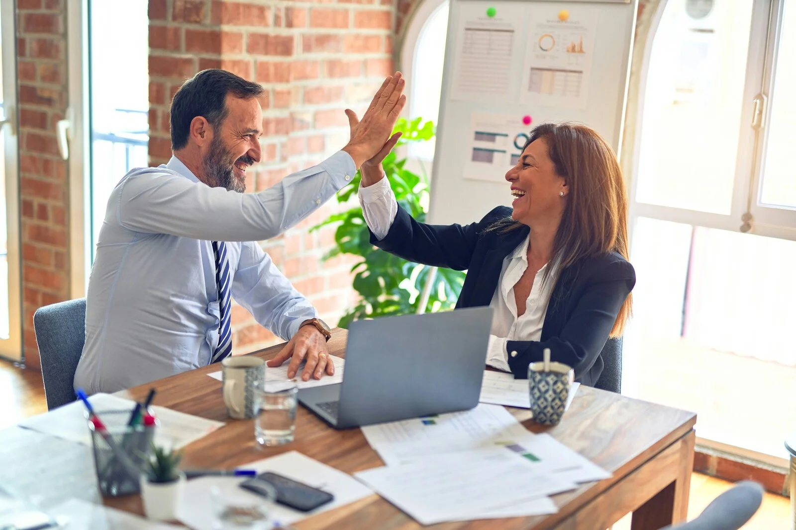 Colleagues discussing a business project